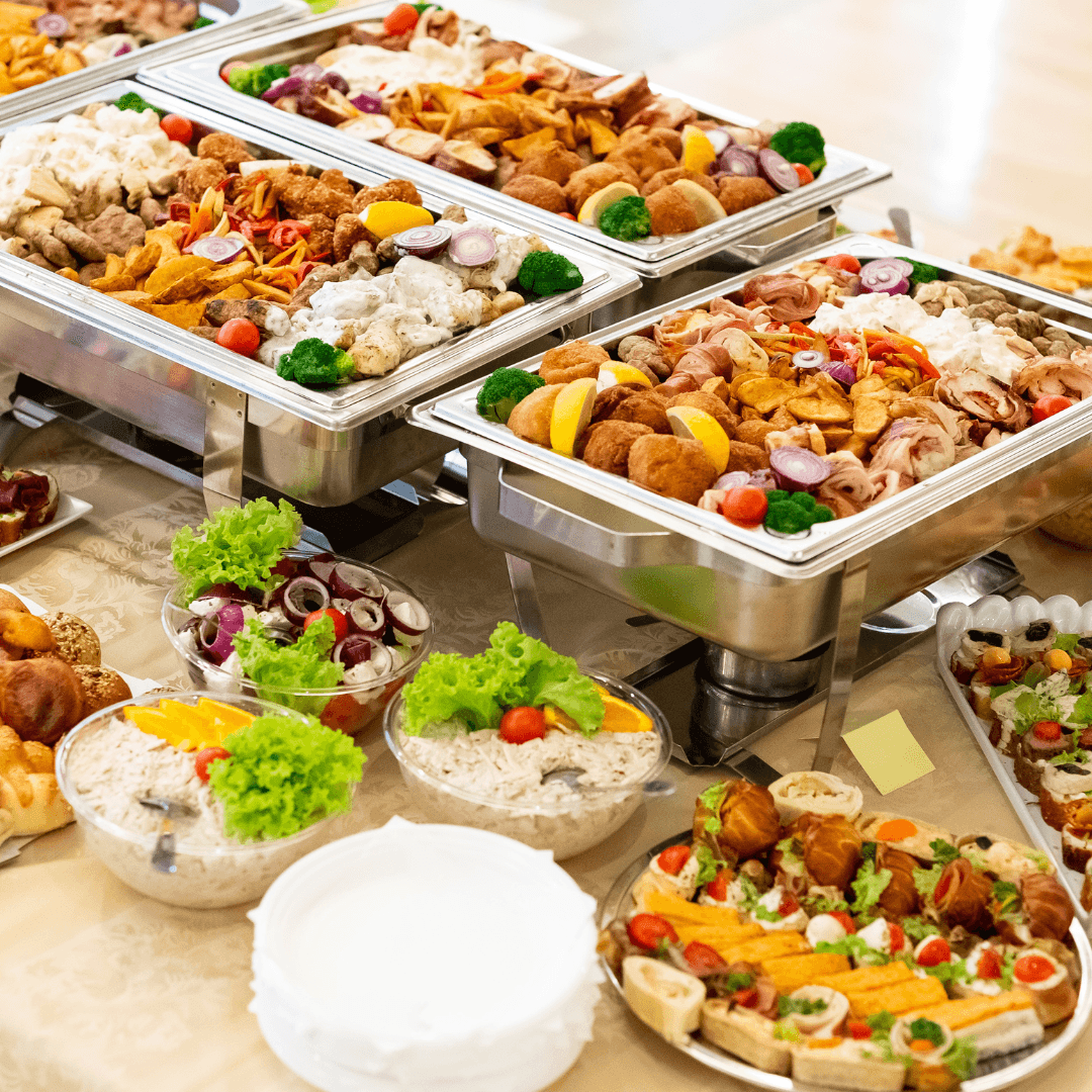 Catering food display with various dishes and trays